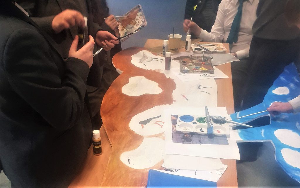 Young artists creating their arty birds